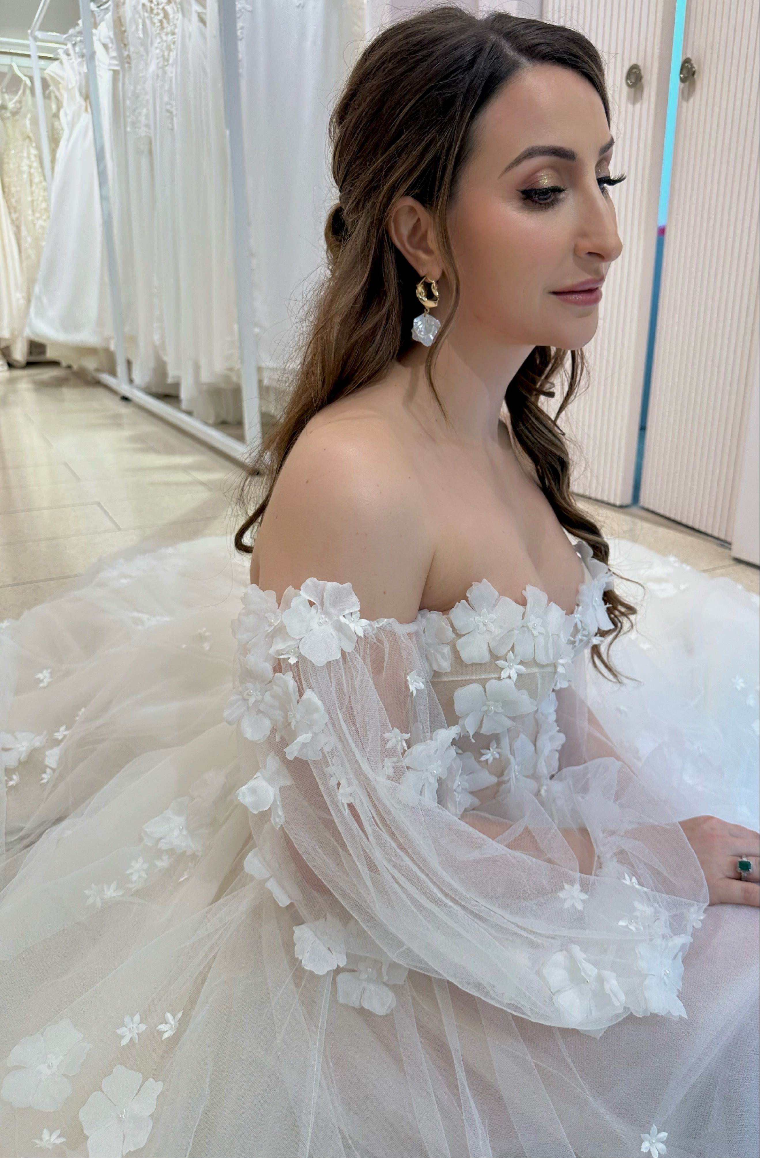 Abstract Gold earrings adorned with acrylic petals, designed for brides.