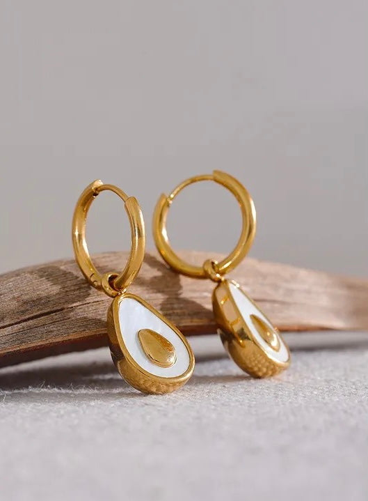 18k gold avocado earrings with a mother of pearl inner, designed to be hypoallergenic and tarnish-resistant for lasting wear