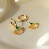 18k gold earrings with a green cubic zirconia centre, featuring a fan-shaped Egyptian-inspired design. These earrings are waterproof and hypoallergenic.