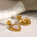 18k gold heart-shaped earrings featuring a mother of pearl inner layer, designed to be hypoallergenic and waterproof