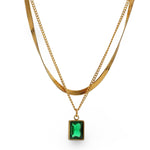 18k gold layered necklace featuring a emerald colour designed to be waterproof and hypoallergenic for everyday wear.