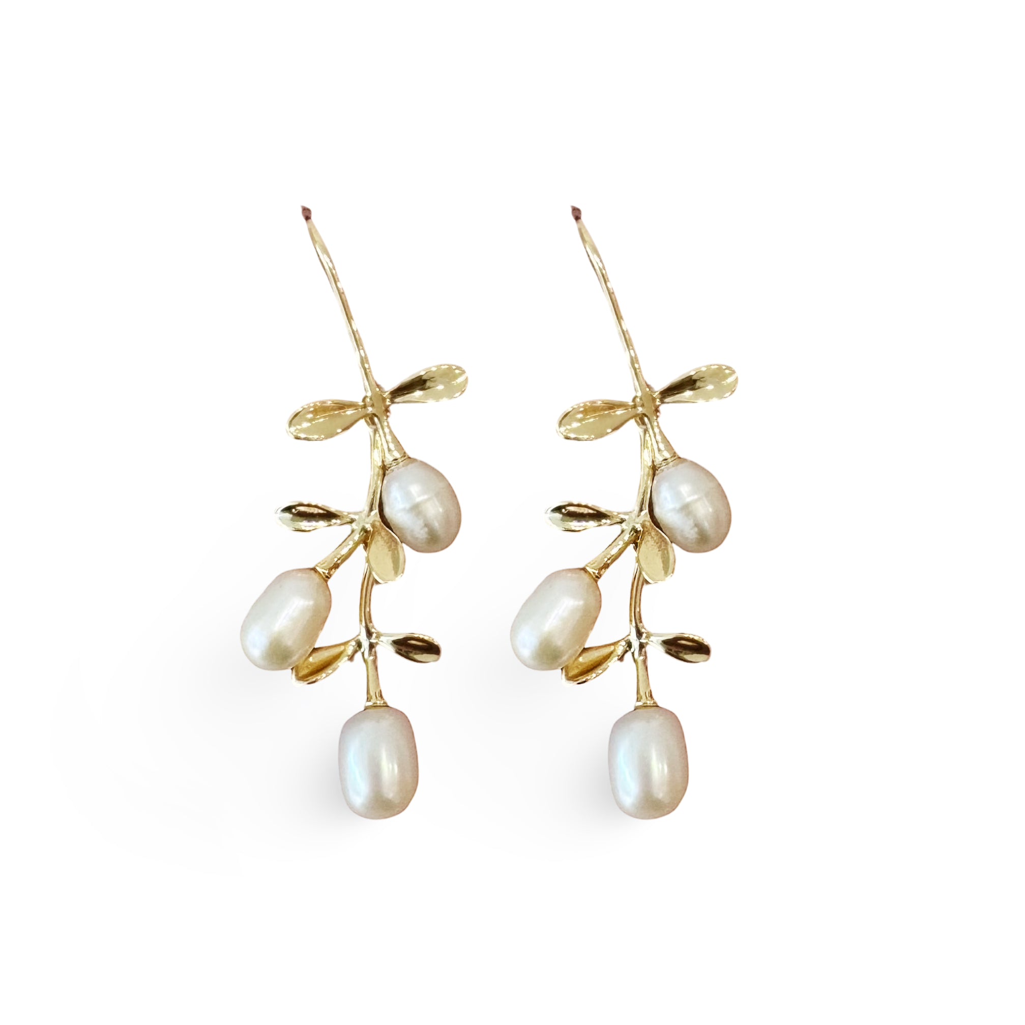 Gold hook earrings featuring tiered drop leaves adorned with three pearls, adding a touch of elegance and nature-inspired charm