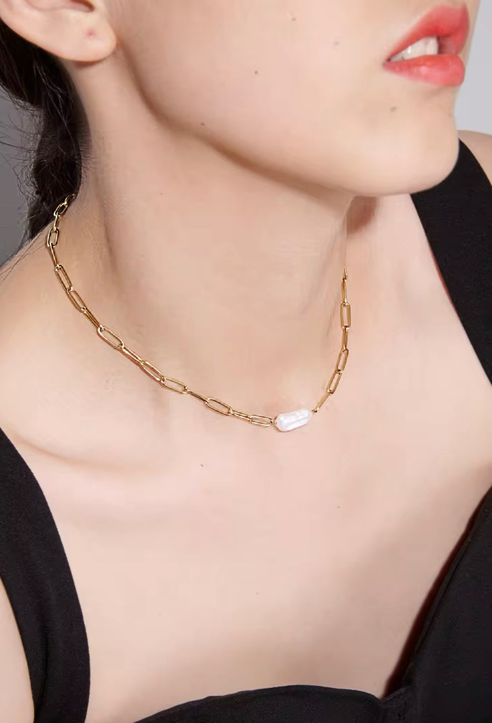 Paper clip necklace featuring a rectangular pearl, designed to be waterproof and tarnish-resistant