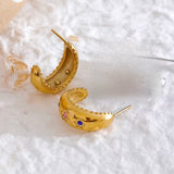 Small hoop earrings with three stars adorned with multi-coloured stones, featuring scalloped edging, designed to be waterproof and hypoallergenic