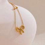 18k gold necklace satellite chain featuring a bow design, crafted to be waterproof and hypoallergenic for everyday wear