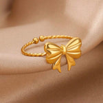 18k gold adjustable bow ring, designed to be waterproof and tarnish-resistant for lasting beauty.