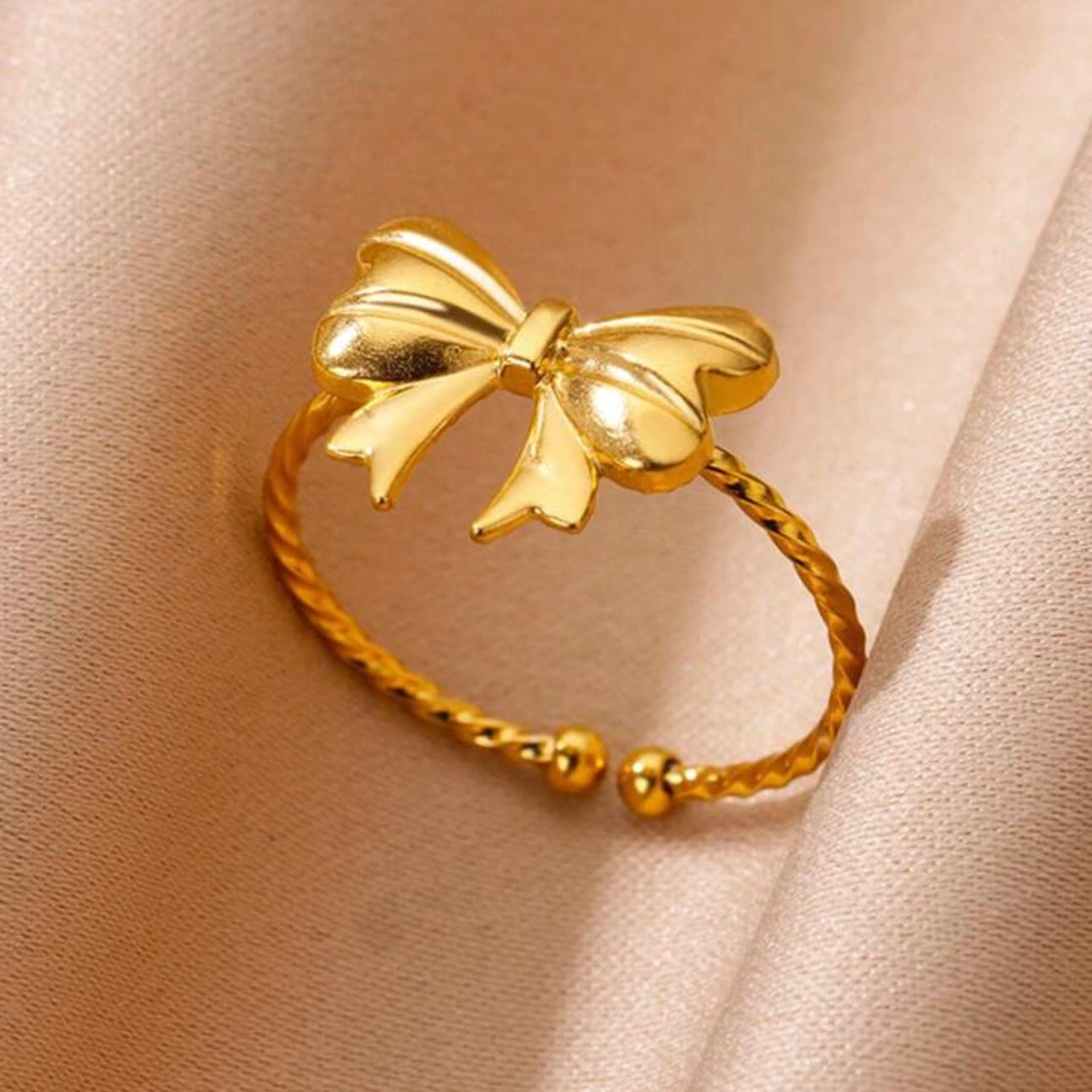 18k gold adjustable bow ring, designed to be waterproof and tarnish-resistant for lasting beauty.